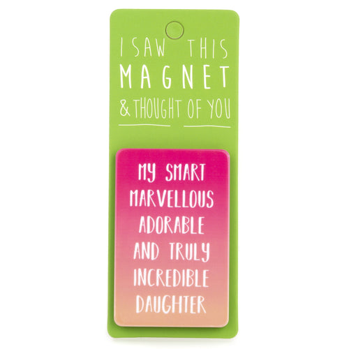 A fridge magnet saying 'Incredible Daughter'