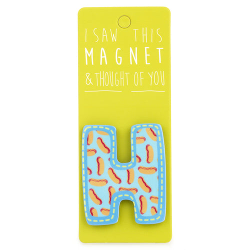 A fridge magnet saying 'H'