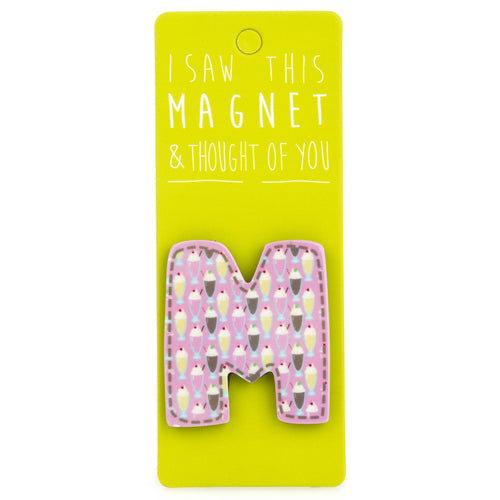 A fridge magnet saying 'M'