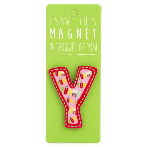 A fridge magnet saying 'Y'