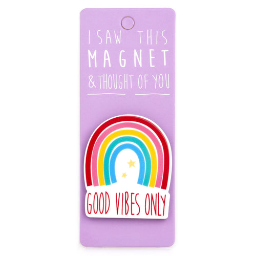 A fridge magnet saying 'Good Vibes'