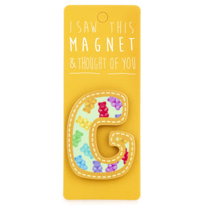 A fridge magnet saying 'G'