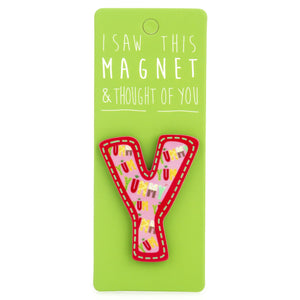 A fridge magnet saying 'Y'