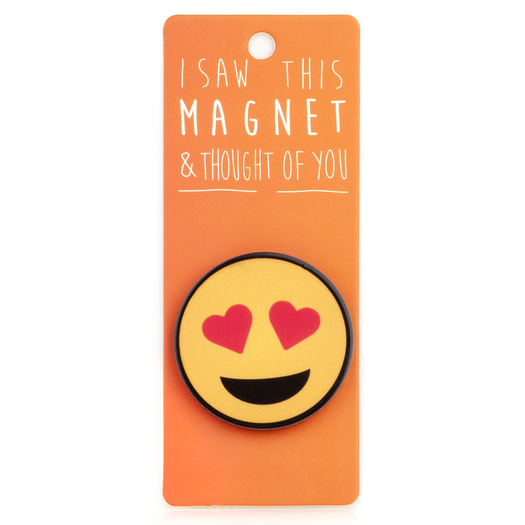 A fridge magnet saying 'Heart Eyes Emoji'