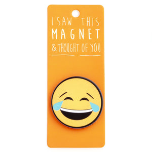 A fridge magnet saying 'Crying Laughing'