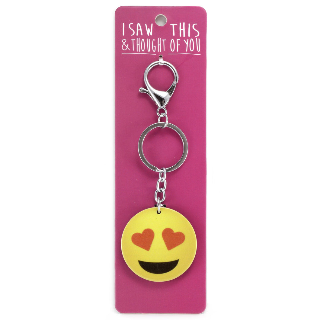 A KEYRING SAYING 'HEART EYES EMOJI'