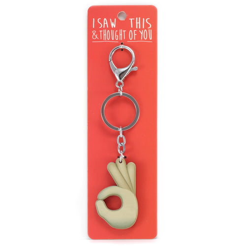 A KEYRING SAYING 'OK EMOJI'