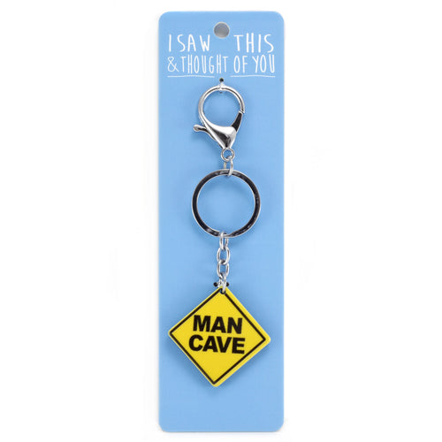 A KEYRING SAYING 'MAN CAVE'