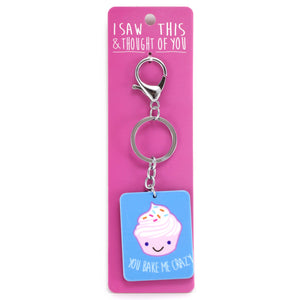 A KEYRING SAYING 'BAKE ME CRAZY'